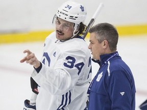 Sheldon Keefe and Auston Matthews talk at Toronto Maple Leaf practice at the Ford Performance Centre in Toronto on Monday November 25, 2019. Craig Robertson/Toronto Sun/Postmedia Network