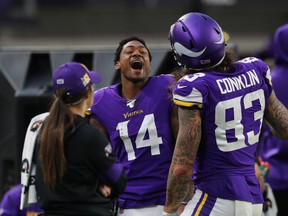 Minnesota Vikings' Stefon Diggs and Tyler Conklin were laughing against the Lions, but the game was a push for bettors. (GETTY IMAGES)