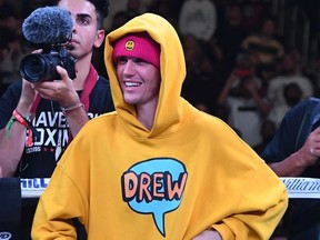 Justin Bieber waits in the ring after the fight between KSI and Logan Paul at Staples Center in Los Angeles on Nov. 9, 2019.
