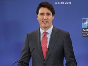 Prime Minister Justin Trudeau speaks at the NATO summit at the Grove hotel on December 4, 2019 in Watford, England.  (Photo by Steve Parsons - WPA Pool/Getty Images)