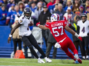 Lamar Jackson and the Ravens are an impressive 11-2 this season. Brett Carlsen/Getty Images)