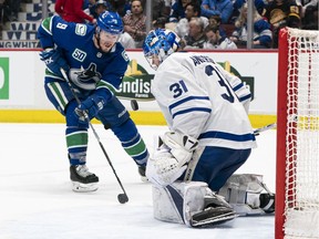 J.T. Miller #9 of the Vancouver Canucks is stopped by goalie Frederik Andersen #31 of the Toronto Maple Leafs during NHL action at Rogers Arena on December 10, 2019 in Vancouver, Canada. (Photo by Rich Lam/Getty Images)