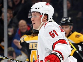 Jake Gardiner #51 of the Carolina Hurricanes reacts after Charlie Coyle #13 of the Boston Bruins scored a goal during the third period at TD Garden on Dec. 3, 2019 in Boston, Massachusetts. The Bruins defeat the Hurricanes 2-0.  (Photo by Maddie Meyer/Getty Images)