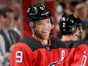 Taylor Hall of the New Jersey Devils looks on during warm ups before the game against the Chicago Blackhawks at Prudential Center on December 6, 2019 in Newark, New Jersey.