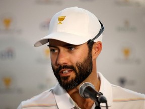 Adam Hadwin of Canada and the International team looks on during media availability ahead of the 2019 Presidents Cup at the Royal Melbourne Golf Course on December 10, 2019 in Melbourne, Australia.