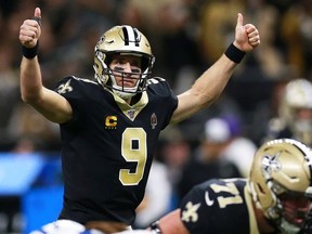 Quarterback Drew Brees of the New Orleans Saints calls a play on the line of scrimmage during the game against the Indianapolis Colts at Mercedes Benz Superdome on December 16, 2019 in New Orleans, Louisiana.