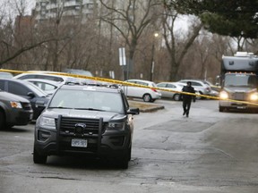 Police investigate a fatal shooting at an apartment building located at 400 McCowan Rd. on  Dec. 29, 2019. (Veronica Henri, Toronto Sun)