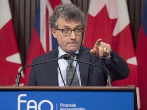 Ontario Financial Accountability Officer Peter Weltman answers questions in Toronto on Monday December 10, 2018. THE CANADIAN PRESS/Frank Gunn