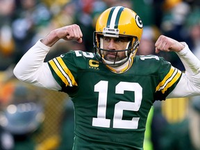 Green Bay Packers quarterback Aaron Rodgers celebrates during last week's win over Chicago. (GETTY IMAGES)