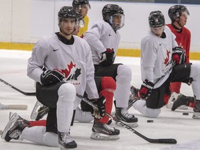 Canada's Joe Veleno takes a break during the team's practice at the World Junior Hockey Championships on Dec. 29, 2019 in Ostrava, Czech Republic. (THE CANADIAN PRESS/Ryan Remiorz)
