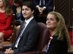 Prime Minister Justin Trudeau, left, and Governor General Julie Payette look to the gallery as they wait to deliver the Throne Speech in the Senate chamber on Dec. 5, 2019 in Ottawa. (FRED CHARTRAND/POOL/AFP via Getty Images)
