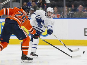 Maple Leafs forward Alexander Kerfoot takes a shot against the Edmonton Oilers during the second period at Rogers Place on Saturday night. Kerfoot had a goal and an assist on Saturday night. (Perry Nelson/USA TODAY Sports)