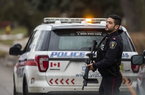 York Regional Police tactical officers at an armed standoff on Elmwood Ave., near Major Mackenzie Dr. and Bayview Ave. in Richmond Hill, on Friday, Dec. 27, 2019. (Ernest Doroszuk/Toronto Sun/Postmedia Network)