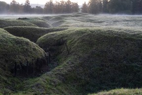The sunrise burns off the morning mist over the remains of trenches in the Newfoundland Memorial Park at Beaumont Hamel on Nov. 09, 2018 in Albert, France. (Christopher Furlong/Getty Images)