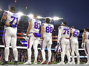 Members of the Buffalo Bills look on before a game against the New England Patriots at Gillette Stadium on December 21, 2019 in Foxborough. (Billie Weiss/Getty Images)