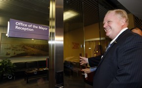 In this Dec. 1, 2010, file photo, the late Rob Ford enters his office on his first day at City Hall as mayor of Toronto.