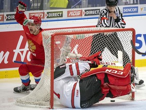 Russia's Alexander Khovanov celebrates after scoring against Canada's Nico Daws during action at the World Junior Championship, Saturday, December 28, 2019 in Ostrava, Czech Republic. (THE CANADIAN PRESS/Ryan Remiorz)