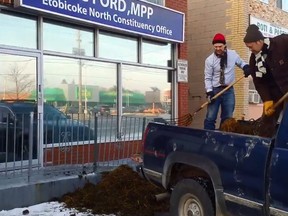 Protesters leave manure outside Premier Doug Ford's constituency office in Etobicoke on Sunday, Dec. 22, 2019. (Screengrab)