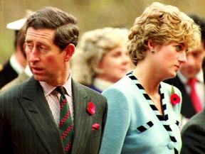 Britain’s Prince Charles and Diana, Princess of Wales, stand together at the memorial to the British Gloster Regiment outside Seoul during a four-day official visit to Korea on Nov. 3, 1992. The Queen remarked on an “annus horribilis” (horrible year) in her Christmas speech on Dec. 25, 1992, after her sons, Charles and Andrew, separated from their wives and daughter Anne divorces from her husband. (AFP/Getty Images)