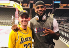 Corey Groves, left, with hero LeBron James on Christmas Day 2019 in Los Angeles.