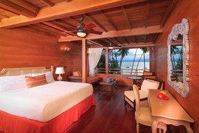 Playa Cativo’s deluxe guestroom in the main lodge features a king size bed and sweeping views of the gulf. (Playa Cativo photo)