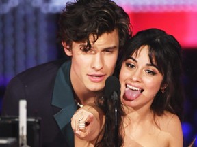 Shawn Mendes and Camila Cabello accept the Collaboration of the Year award for 'Señorita' onstage during the 2019 American Music Awards at Microsoft Theater on Nov. 24, 2019 in Los Angeles, Calif. (Kevin Winter/Getty Images for dcp)