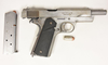 A loaded Colt .45 handgun was recovered after a man shot himself while trying to steal Tarzan, an American Bulldog, in Brampton, Ont., on Friday, Dec. 20, 2019. (Peel Regional Police handout)