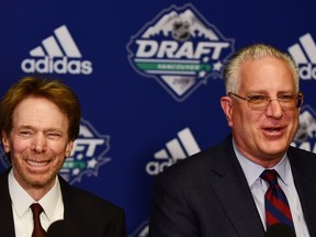 NHL Seattle owner Jerry Bruckheimer (left) and NHL Seattle president Tod Leiweke speak at a press conference before the first round of the 2019 NHL Draft at Rogers Arena.