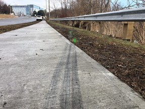 Tire tracks on the sidewalk on Progress Ave. where three young men were struck by an alleged drunk driver on Sunday, Dec. 22, 2019. Two of the pedestrians were killed.