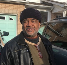 Abraham Scott, who lives across the street from the Stallion Pl. home where a woman burned to death Wednesday evening