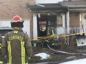Toronto fire crews attend the scene of a fatal house fire in Rexdale on Thursday, Dec. 12 2019