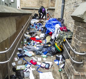 A mess of possessions on a wheelchair ramp at the Church of the Holy Trinity, outside of CF Toronto Eaton Centre in Toronto, Ont. on Thursday December 26, 2019.