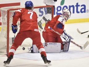 A puck gets past Czech goalkeeper Lukas Parik during the World Junior Hockey Championships against the United States in Ostrava, Czech Republic, Monday, Dec. 30, 2019.