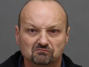 Michael Winn, 53, faces numerous charges for a Nov. 18, 2019 smash-and-grab robbery at Hudson's Bay in Sherway Gardens. (Toronto Police handout)