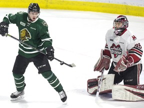 London Knight Connor McMichael tips the puck but can't get it past  Guelph Storm goalie Nico Daws in the third period of their OHL playoff game in London, Ont. on Sunday April 7, 2019. Derek Ruttan/The London Free Press/Postmedia Network