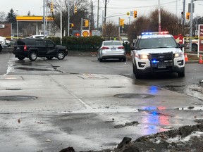 A damaged SUV sits in a Richmond Hill gas station following a shooting Friday morning.