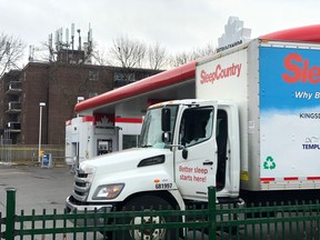 A delivery truck with a shattered window sits in a Richmond Hill gas station following a police-involved shooting at Major Mackenzie Dr. and Bayview Ave. in Richmond Hill on Friday, Dec. 27, 2019. (Ernest Doroszuk/Toronto Sun/Postmedia Network)