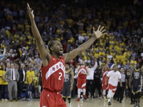 Kawhi Leonard celebrates after leading the Raptors to the NBA title in June. AP PHOTO