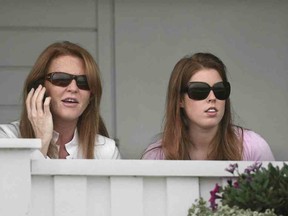 Sarah Ferguson, Duchess of York, left, and daughter Princess Beatrice attend The Queen's Cup final at Guards Polo Club in 2006. Poor Bea, says Fergie. GETTY IMAGES