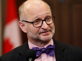 Canada's Minister of Justice and Attorney General of Canada David Lametti speaks to media in the House of Commons foyer on Parliament Hill in Ottawa December 12, 2019.  REUTERS/Blair Gable