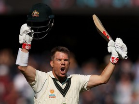 David Warner of Australia celebrates his triple century during day two of the 2nd Domain Test between Australia and Pakistan at the Adelaide Oval on Nov. 30, 2019 in Adelaide, Australia. (MARK KOLBE/Getty Images)