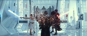 Daisy Ridley as Rey and Adam Driver as Kylo Ren in Star Wars: The Rise of Skywalker.