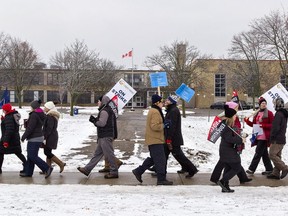 Teachers and support staff represented by the Ontario Secondary School Teachers Federation (OSSTF) picket in front of Pauline Johnson Collegiate in Brantford Dec. 4, 2019 during a one-day, provincewide strike. (Brian Thompson/Postmedia Network)
