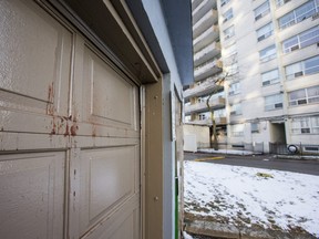The door to the entrance of the underground parking lot at 71 Thorncliffe Park Dr. in Toronto on Sunday December 22, 2019. Two men were taken to hospital with non-life-threatening injuries after a double shooting in East York on Saturday night. Ernest Doroszuk/Toronto Sun