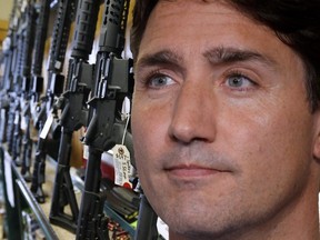 Illustration: An image of Prime Minister Justin Trudeau with AR-15 assault rifles in the background
