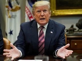 U.S. President Donald Trump speaks to reporters while participating in a "roundtable on small business and red tape reduction accomplishments" in the Roosevelt Room at the White House in Washington, D.C., Dec. 6, 2019.