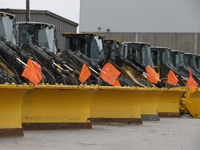 Snow plows lined up at Toronto's maintenance facility on Eastern Ave., on Saturday November 30, 2019.
