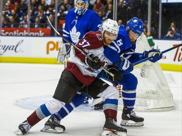 Toronto Maple Leafs Jake Muzzin and goalie Frederik Andersen  during 2nd period action against Colorado Avalanche J.T. Compher at the Scotiabank Arena in Toronto on Wednesday December 4, 2019. Ernest Doroszuk/Toronto Sun/Postmedia