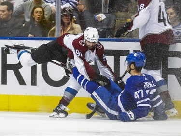 Toronto Maple Leafs Pierre Engvall is checked during 3rd period by Colorado Avalanche Nazem Kadri at the Scotiabank Arena in Toronto on Wednesday December 4, 2019. Ernest Doroszuk/Toronto Sun/Postmedia