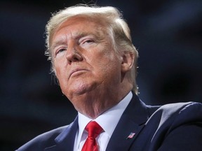 U.S. President Donald Trump looks on during a campaign rally in Battle Creek, Michigan, U.S., December 18, 2019.